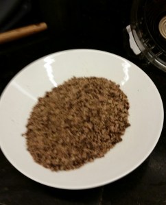 A bowl of ground up dried beef