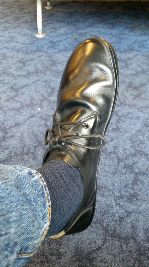 Black leather dress shoes by Vivobarefoot