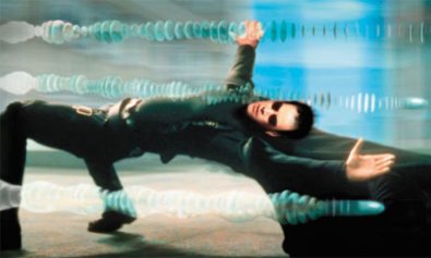 Neo dodging bullets in The Matrix (Warner Brothers 1999)