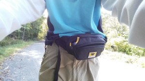 Minimalist kit contains water filter, flashlight, cellphone, SPOT personal locator beacon, and compass.