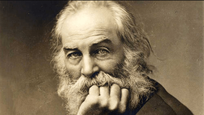 Walt Whitman, poet of democracy, singer of the open road, staring pensively, chin resting on hand